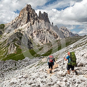 Cima Ambrizzola and Croda da Lago with three hikers