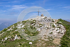 Cima delle Pozzette, A cross on the top of a mountain, turistic train Alta Via del Monte Baldo