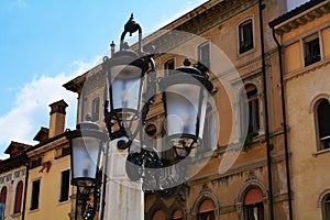 Cima Square, lamp, historical buildings in Conegliano Veneto, Treviso, Italy photo