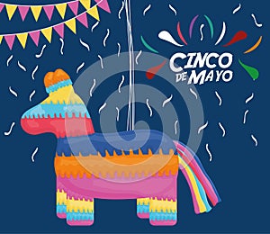 Cinco de mayo celebration with pinata and mexican icons