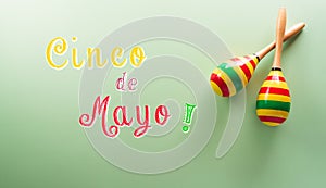 Cinco de Mayo holiday background made from maracas and the text on pastel background