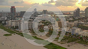 Cinema aerials of Miami Beach with beautiful sunset clouds