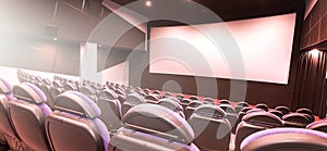 Cinema auditorium with line of red chairs, sitting visitors and silver screen. Ready for adding your own picture