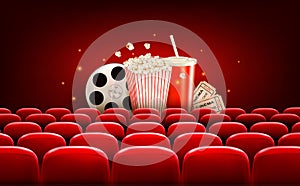 Cinema background with a film reel, popcorn