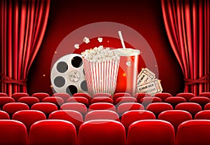 Cinema background with a film reel, popcorn, drink and tickets.