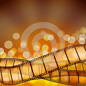 Cinema background with film strips and light rays