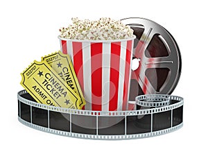 Cinema concept: Film reel, popcorn, cinema tickets isolated white background