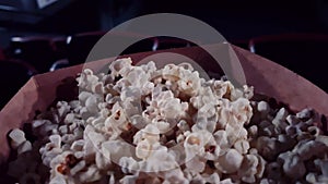 Cinema and entertainment, popcorn box in the movie theatre for tv show streaming service and film industry production