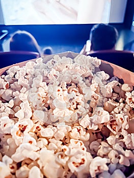 Cinema and entertainment, popcorn box in the movie theatre for tv show streaming service and film industry production