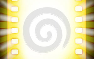 Cinema film strips with and projector light rays. Black and yellow