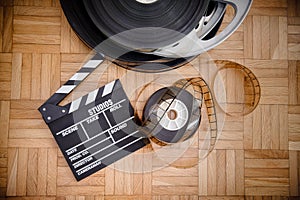 Cinema movie clapper board and film reel