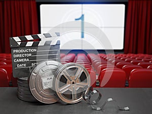 Cinema, movie or home video concept background. Film reels and c