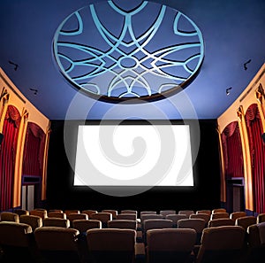 Cinema theater showing empty white movie screen