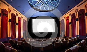 Cinema theater showing empty white movie screen.