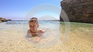 Cinemagraph of a Child Play on the Beach