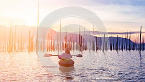 Cinemagraph Continuous Loop Animation of Girl Kayaking during Sunrise