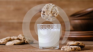 Cinemagraph - Cookie falls into the glass of milk.