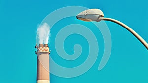 Cinemagraph of smoke emitted from the chimney of the Reading power plant and a modern street lamp