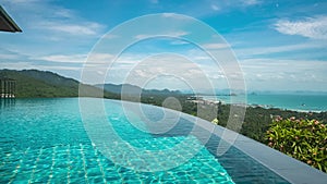 Cinemagraph Timelapse of Infinity Edge Swimming Pool with Sea View in Tropical Country