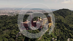 Cinematic aerial shot of world heritage site, pena national palace in Sintra Portugal.