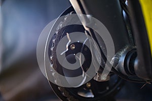 Cinematic Close-up of Bicycle Chainring with Dirty Chain Links