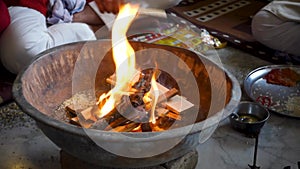 Cinematic footage of Havan or Yagya , a Hindu ritual of offering substances to a holy fire while chanting mantras.Uttarakhand