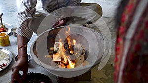 Cinematic footage of Havan or Yagya , a Hindu ritual of offering substances to a holy fire while chanting mantras.Uttarakhand