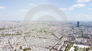 Cinematic sunlight flare over aerial view Paris skyline