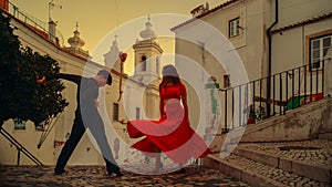 cing a Latin Dance on the Quiet Street of an Old Town in a City. Sensual Dance by Two Professional
