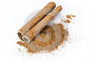 Cinnamon bark stick and ground powder spice. Isolated on white background