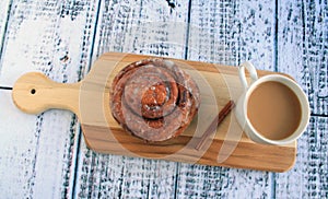 Cinnamon bun with coffee