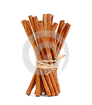 Cinnamon in a bunch on a white background