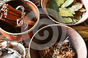 Cinnamon, Dried Arnica, and Bay Leaves