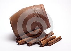 Cinnamon in the form of tubes on white background