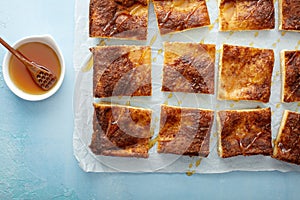 Cinnamon honey cheesecake pie cit into squares