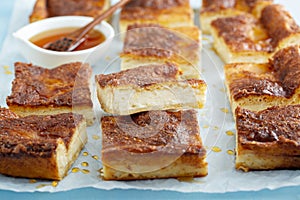 Cinnamon honey cheesecake pie cit into squares photo