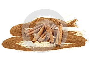 Cinnamon isolated on white background, powder and sticks