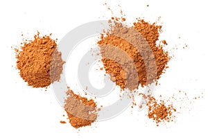 Cinnamon Powder Piles Isolated On White Background
