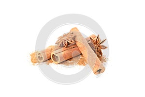 Cinnamon powder, sticks and anise isolated