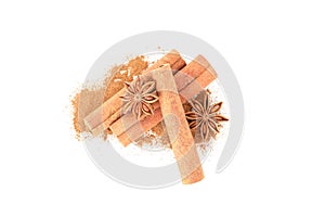 Cinnamon powder, sticks and anise isolated