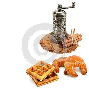 Cinnamon powder and sticks, hand mill and cinnamon baked goods isolated on white background. Free space for text. Collage