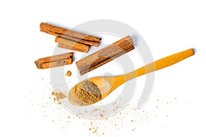 Cinnamon powder and sticks isolated