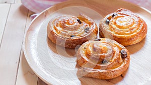 Cinnamon and raisin roll bun