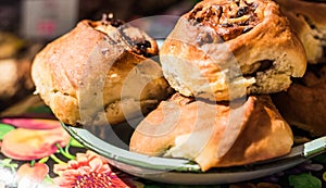 Cinnamon roll buns with raisins at a street food market