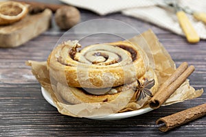 Cinnamon roll close up, danish pastry, sweet pastry for breakfast or snack