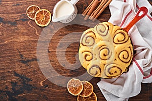 Cinnamon rolls or cinnabon homemade recipe raw dough preparation sweet traditional dessert buns pastry food baked homemade swirl