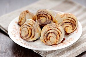 Cinnamon rolls on white plate