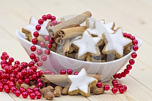 Cinnamon star cookies, nuts and cinnamon stick