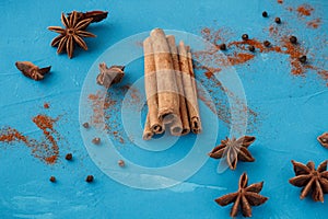 Cinnamon with star-shaped blue background anise