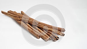 cinnamon stick (Cinnamomum verum) on white background